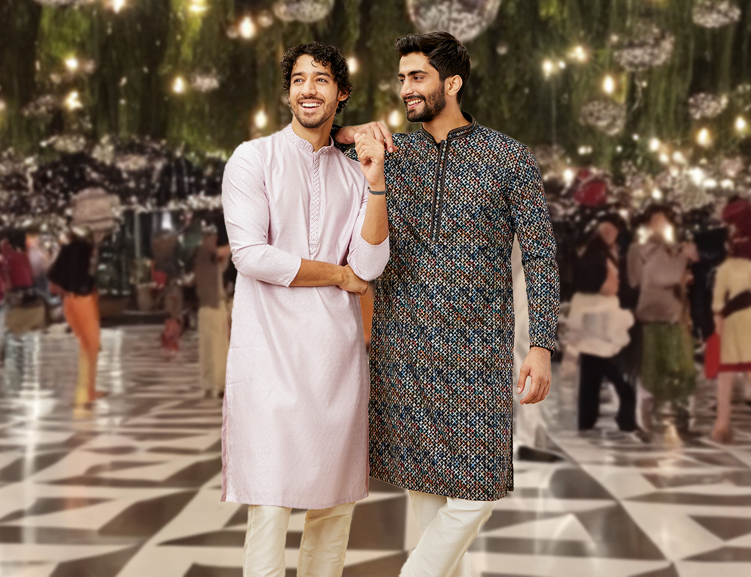 A grrom and his freind in traditional kurta pajama for sangeet ceremony